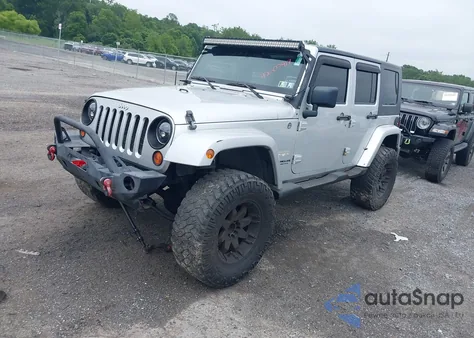 2007 Jeep Wrangler Unlimited Sahara from USA, damaged, VIN 1J4GA59127L211076